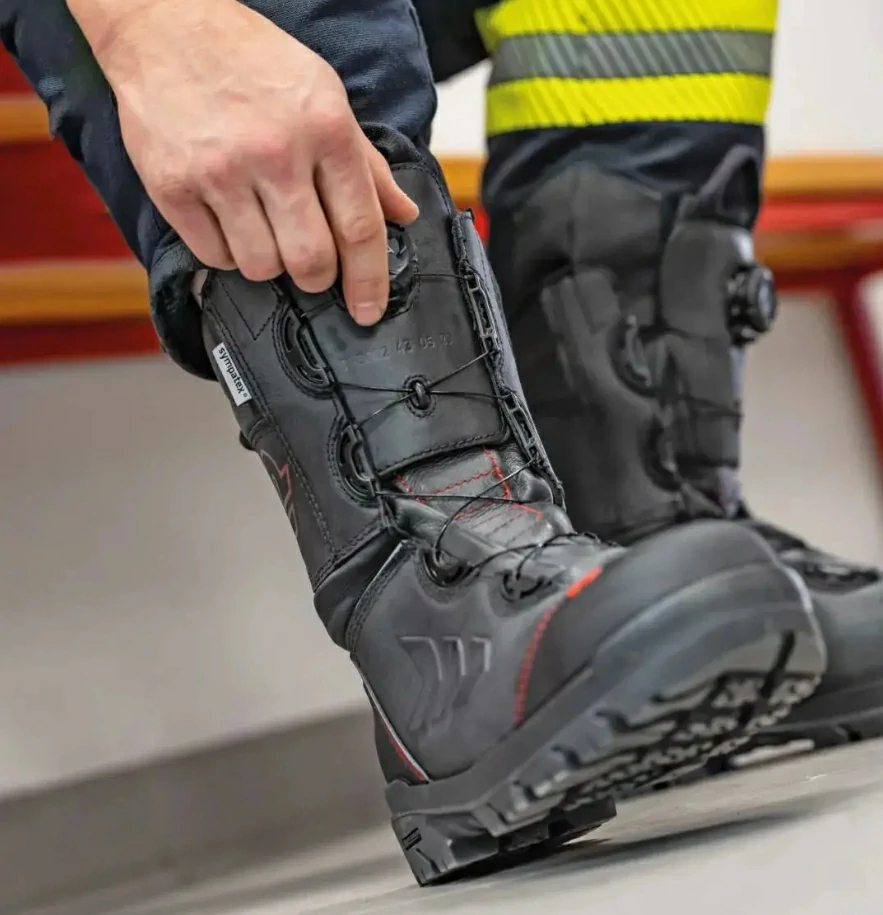 A firefighter wearing Rosenbauer B3 structural boots.